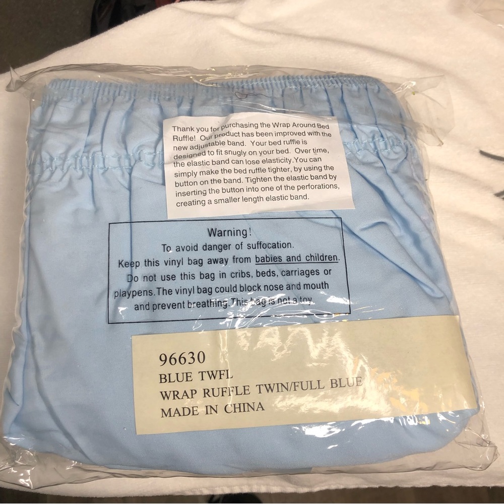Wrap Around bed skirt dust ruffle. Light Blue. Size Twin/Full.